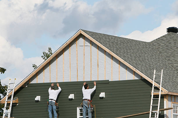 Professional Emergency Siding Repair technician working in Barberton, OH